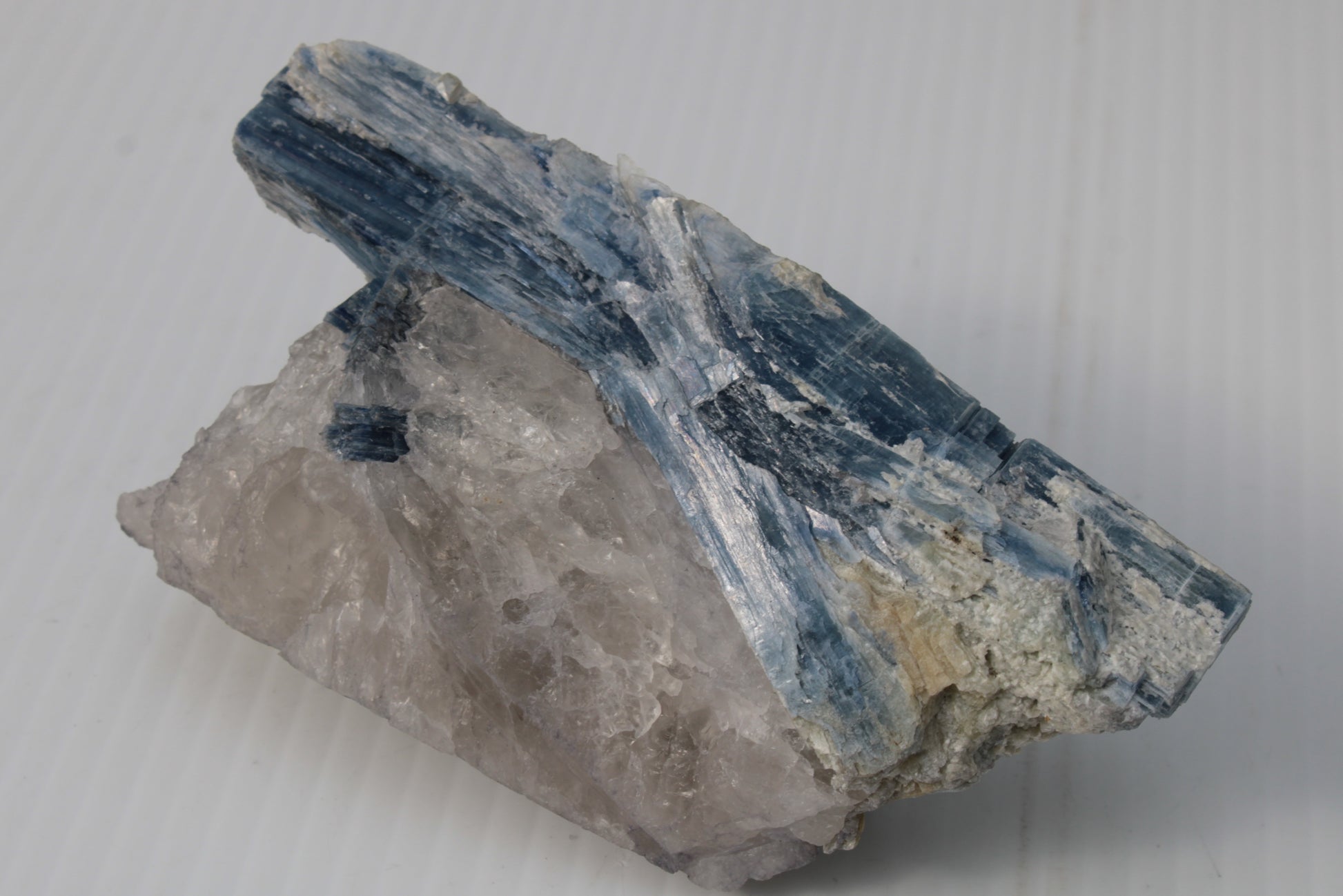 Kyanite blade cluster on clear Quartz 315g Rocks and Things