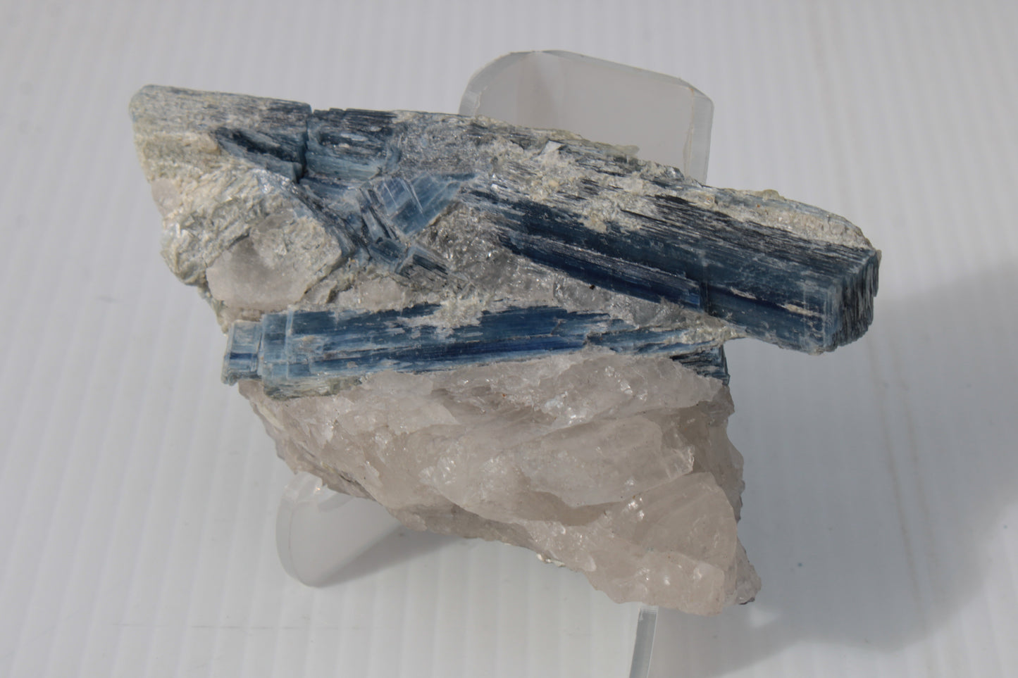 Kyanite blade cluster on clear Quartz 315g Rocks and Things