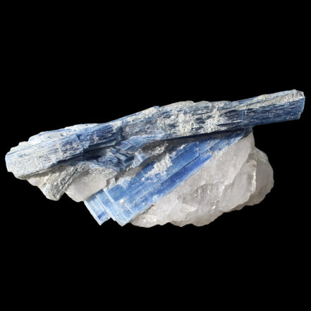 Kyanite blade cluster on clear Quartz 315g in sunlight - Rocks and Things Store