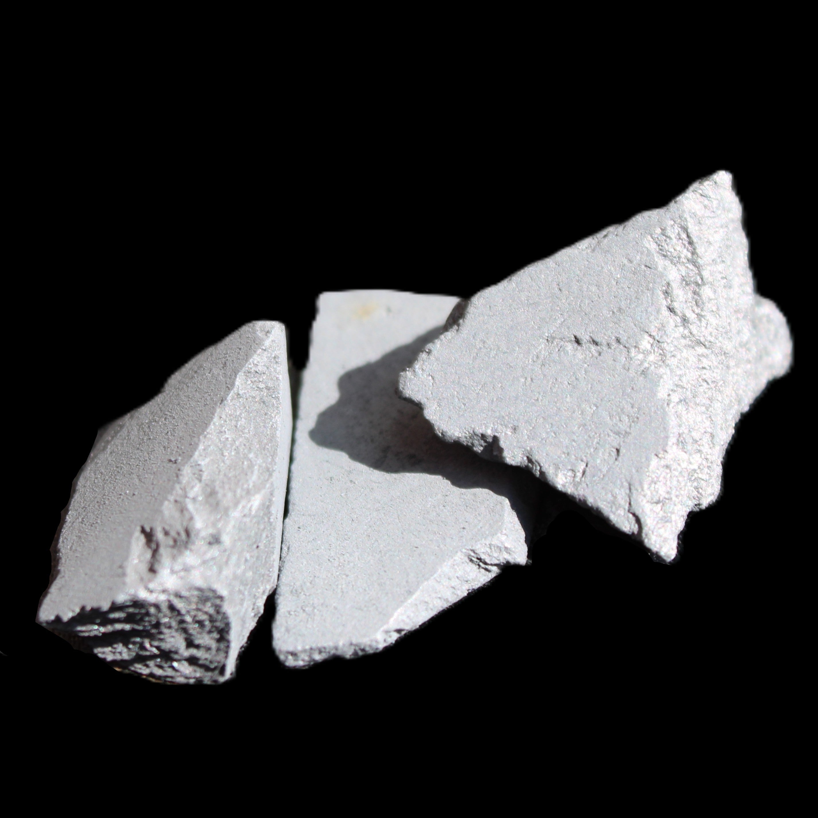 Shungite 2-5 stones 9-11g in sunlight - Rocks and Things Store