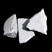 Shungite 2-5 stones 9-11g in sunlight - Rocks and Things Store