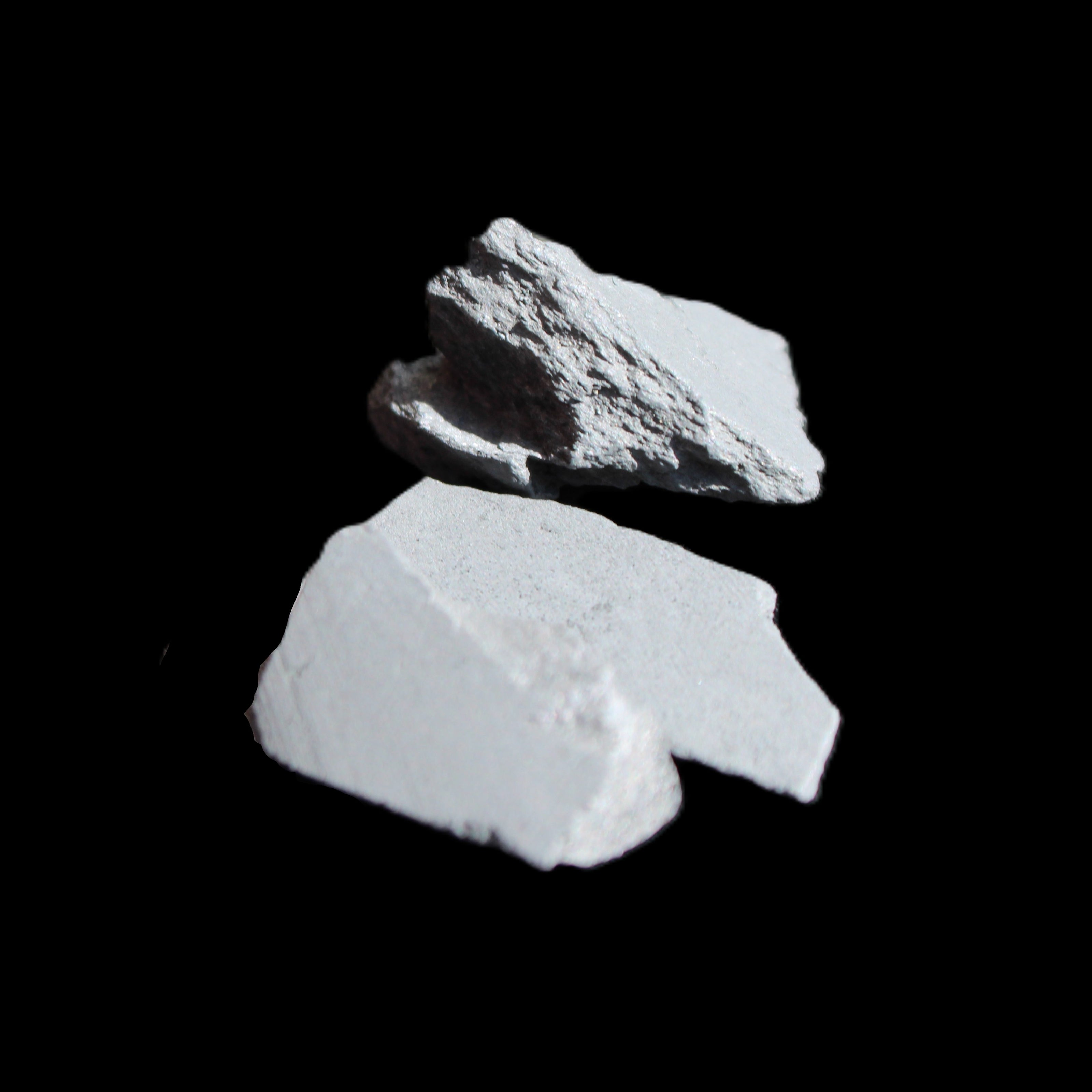 Shungite 2-5 stones 9-11g in sunlight - Rocks and Things Store