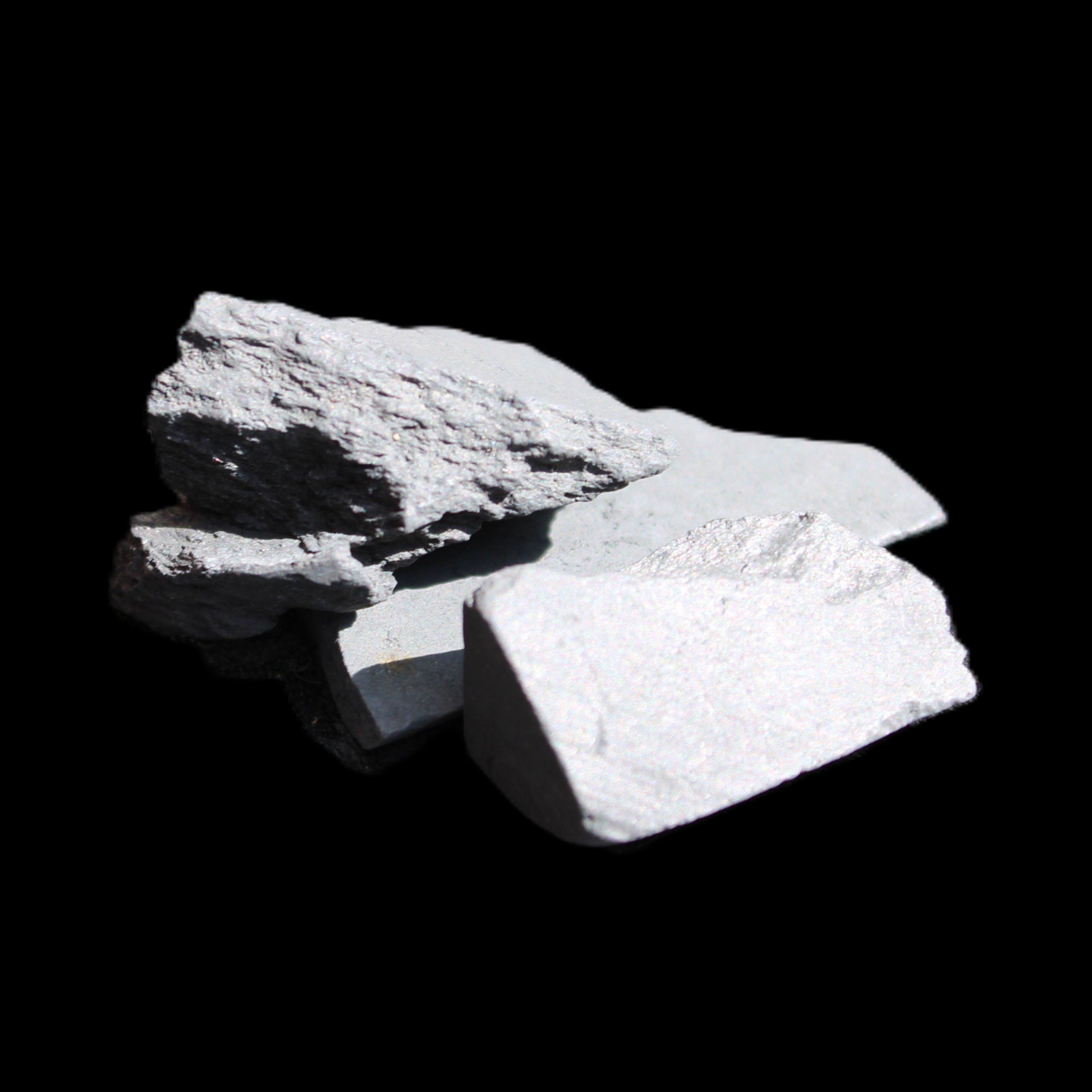 Shungite 2-5 stones 9-11g in sunlight - Rocks and Things Store