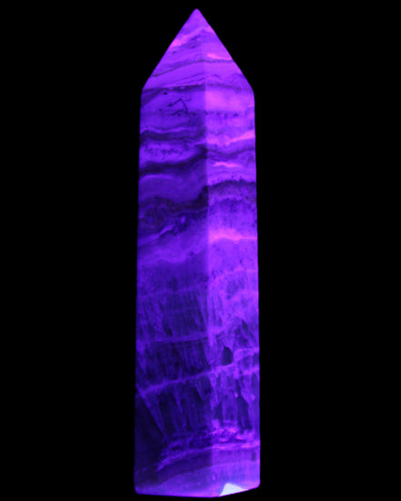 Caribbean Calcite Blue Aragonite wand 71g in UV light - Rocks and Things Store