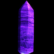 Caribbean Calcite Blue Aragonite wand 71g in UV light - Rocks and Things Store