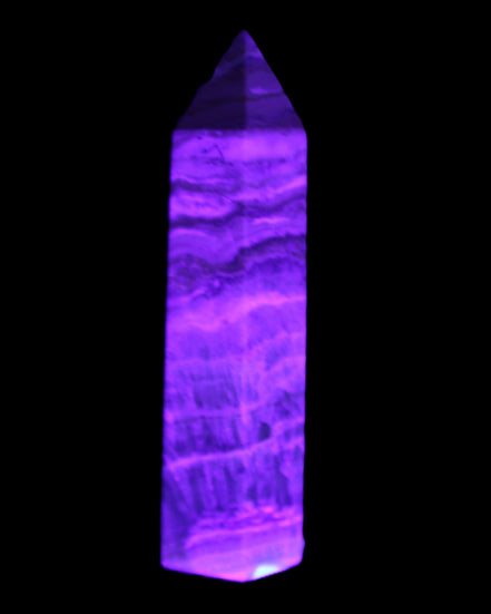 Caribbean Calcite Blue Aragonite wand 71g in UV light - Rocks and Things Store