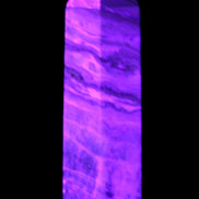 Caribbean Calcite Blue Aragonite wand 71g in UV light - Rocks and Things Store