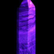 Caribbean Calcite Blue Aragonite wand 71g in UV light - Rocks and Things Store