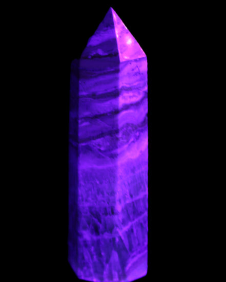 Caribbean Calcite Blue Aragonite wand 71g in UV light - Rocks and Things Store