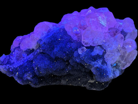 Sparkly Calcite fluorescent cluster 311.2g in UV light