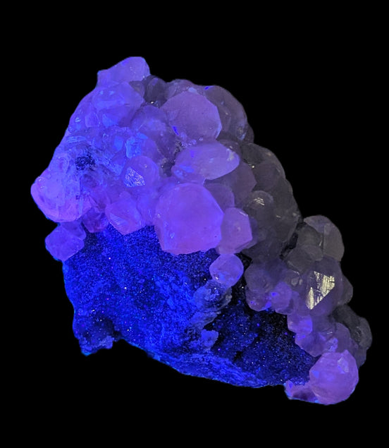 Sparkly Calcite fluorescent cluster 311.2g in UV light - Rocks and Things Store