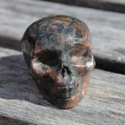Aenigmatite hand-carved skull 76g