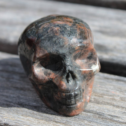 Aenigmatite hand-carved skull 76g