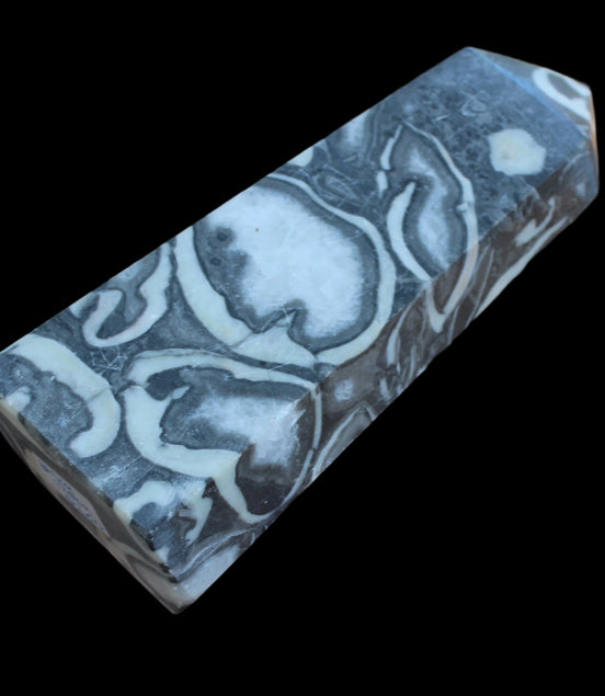 Thousand Eye Stone obelisk 1286g  in sunlight - Rocks and Things Store