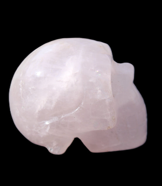 Rose Quartz hand-carved skull 51g in sunlight - Rocks and Things Store