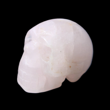 Rose Quartz hand-carved skull 51g in sunlight - Rocks and Things Store