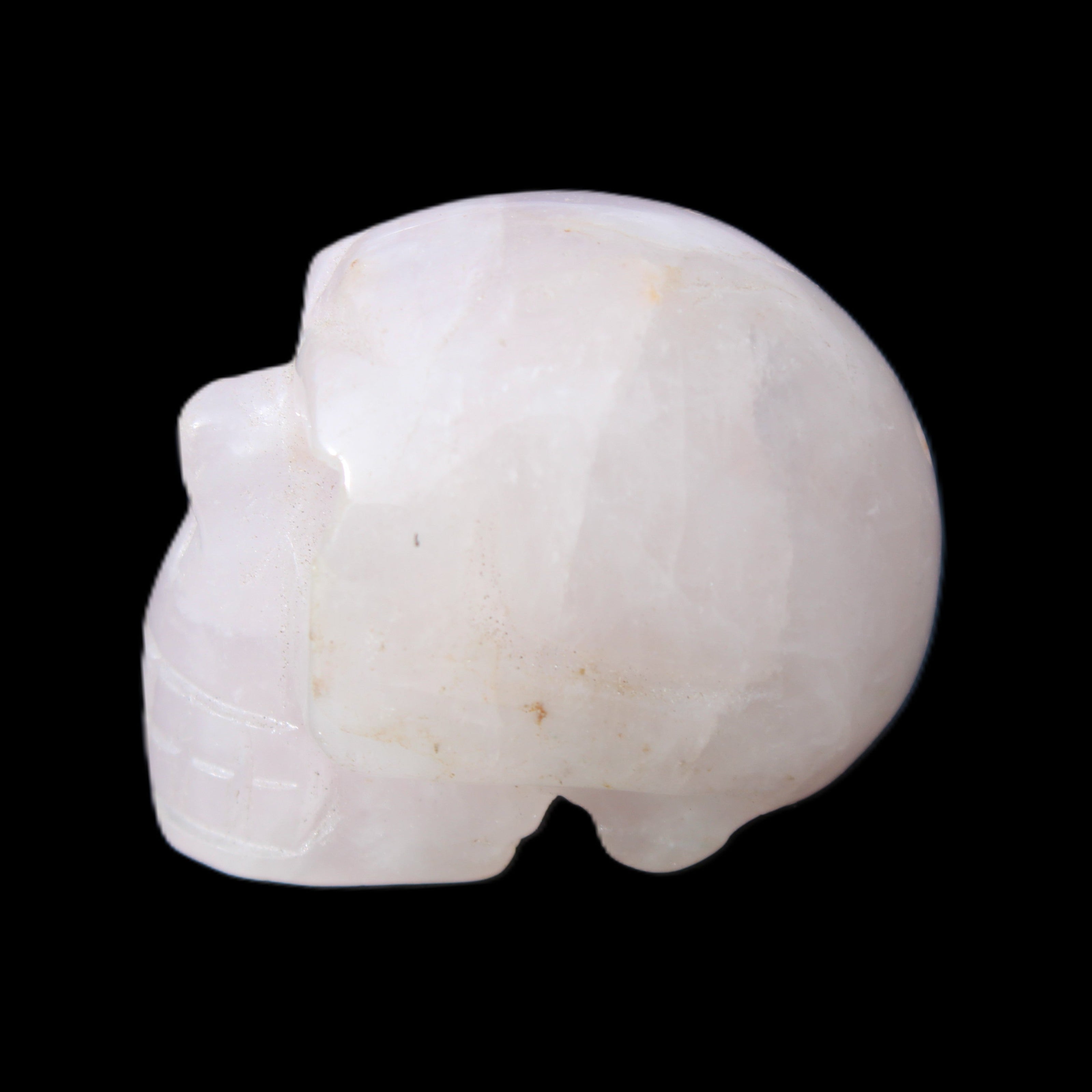 Rose Quartz hand-carved skull 51g in sunlight - Rocks and Things Store
