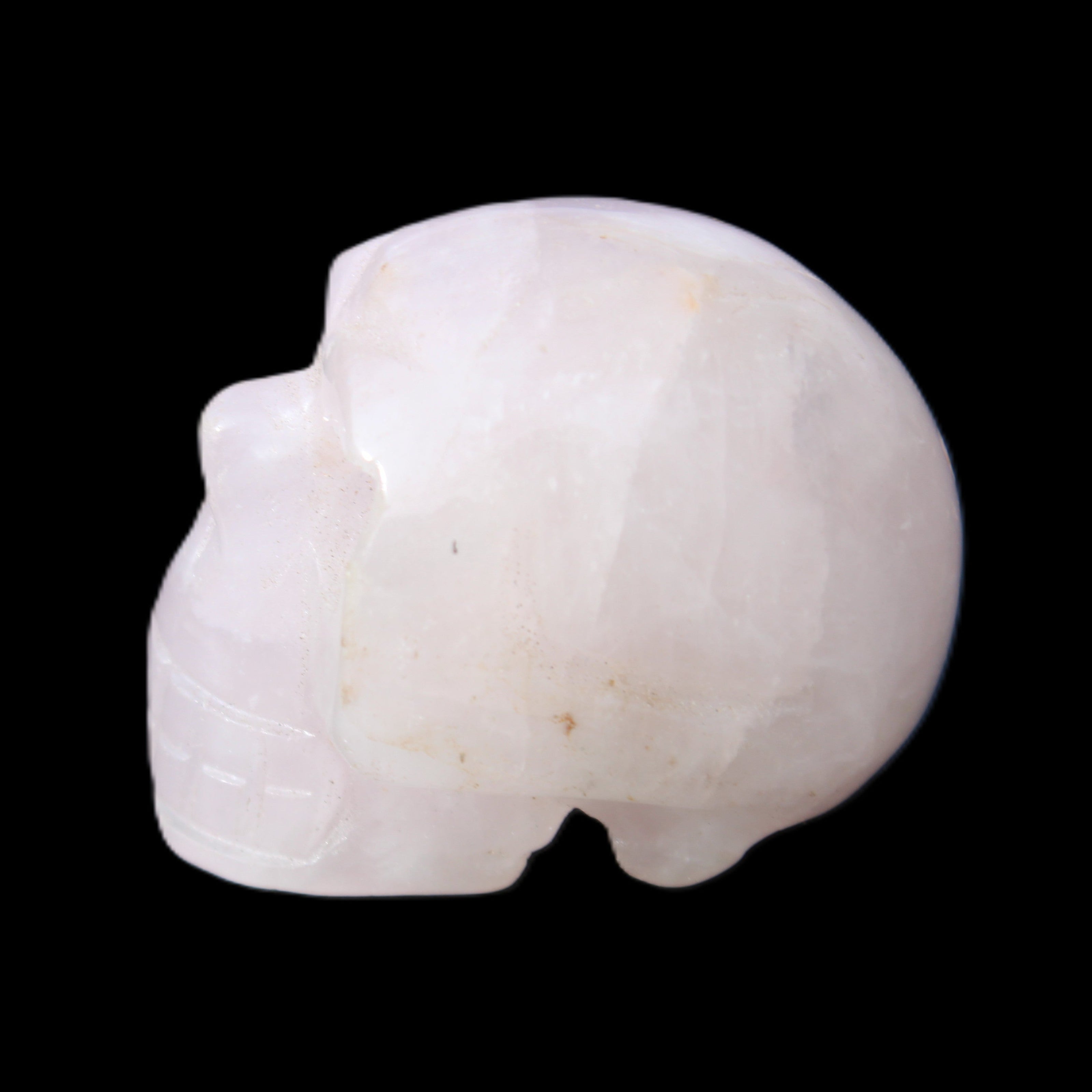 Rose Quartz hand-carved skull 51g in sunlight - Rocks and Things Store