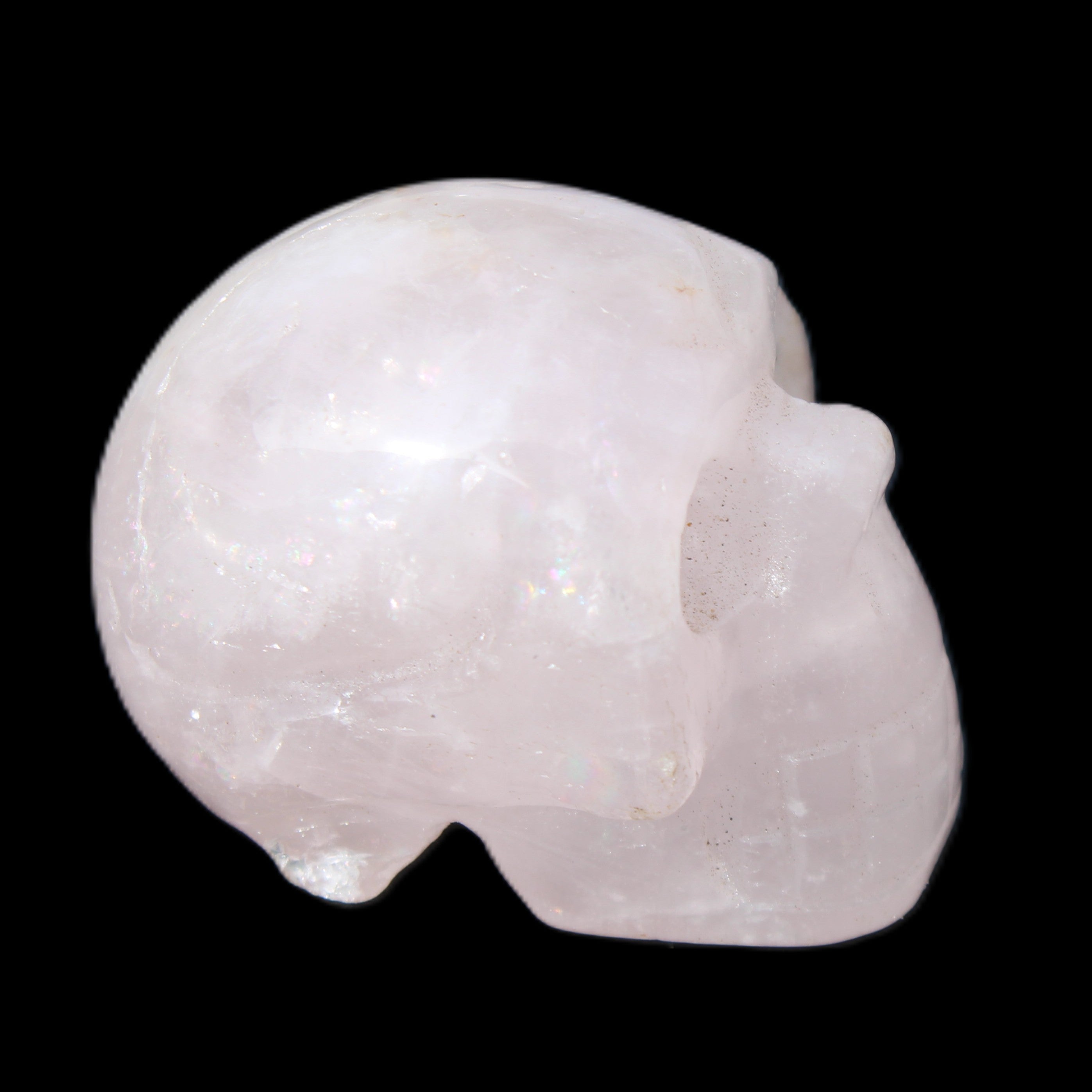 Rose Quartz hand-carved skull 51g in sunlight - Rocks and Things Store