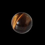 Tigers Eye small sphere 20mm 13g in sunlight - Rocks and Things Store