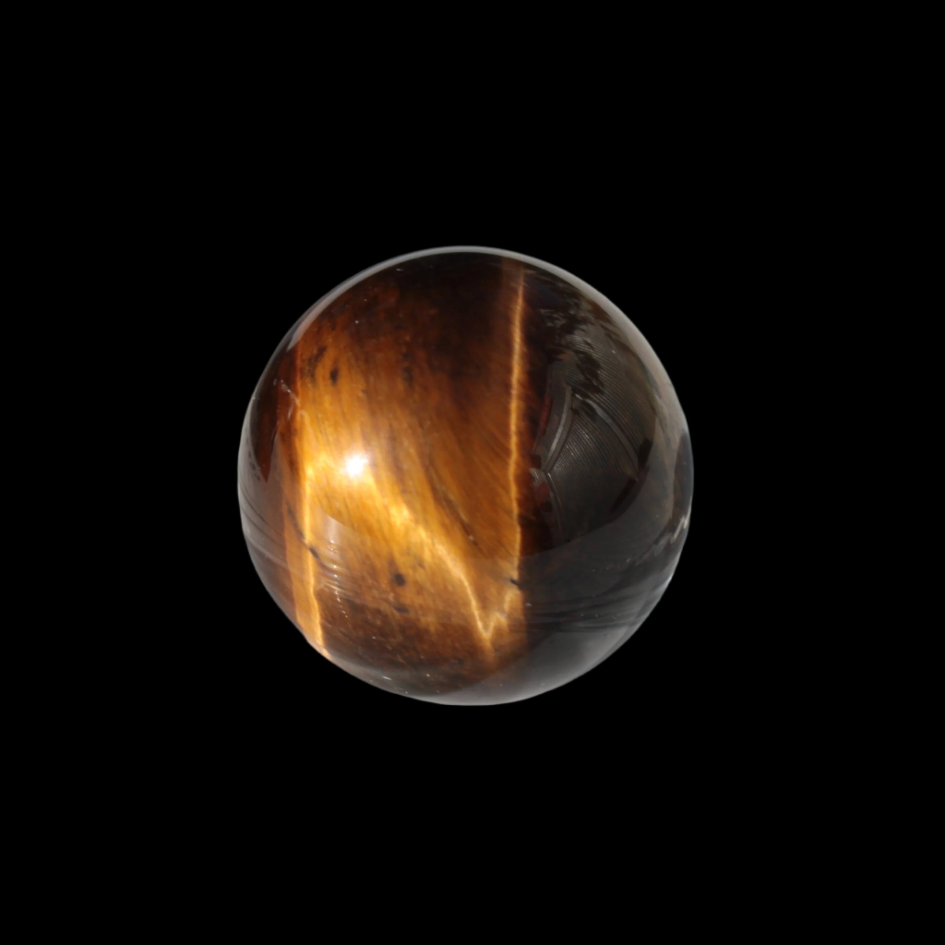 Tigers Eye small sphere 20mm 13g in sunlight - Rocks and Things Store