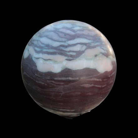 Zebra Stone Jasper sphere 569g in sunlight - Rocks and Things Store