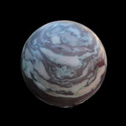Zebra Stone Jasper sphere 569g in sunlight - Rocks and Things Store