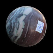 Zebra Stone Jasper sphere 569g in sunlight - Rocks and Things Store