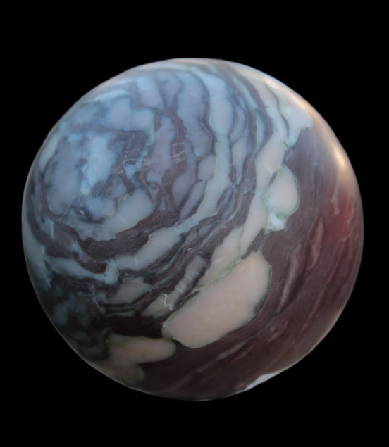 Zebra Stone Jasper sphere 569g in sunlight - Rocks and Things Store