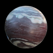 Zebra Stone Jasper sphere 569g in sunlight - Rocks and Things Store