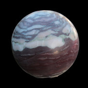 Zebra Stone Jasper sphere 569g in sunlight - Rocks and Things Store