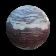 Zebra Stone Jasper sphere 569g in sunlight - Rocks and Things Store