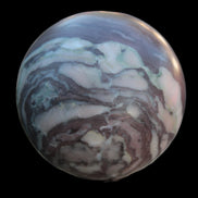 Zebra Stone Jasper sphere 569g in sunlight - Rocks and Things Store