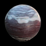 Zebra Stone Jasper sphere 569g in sunlight - Rocks and Things Store