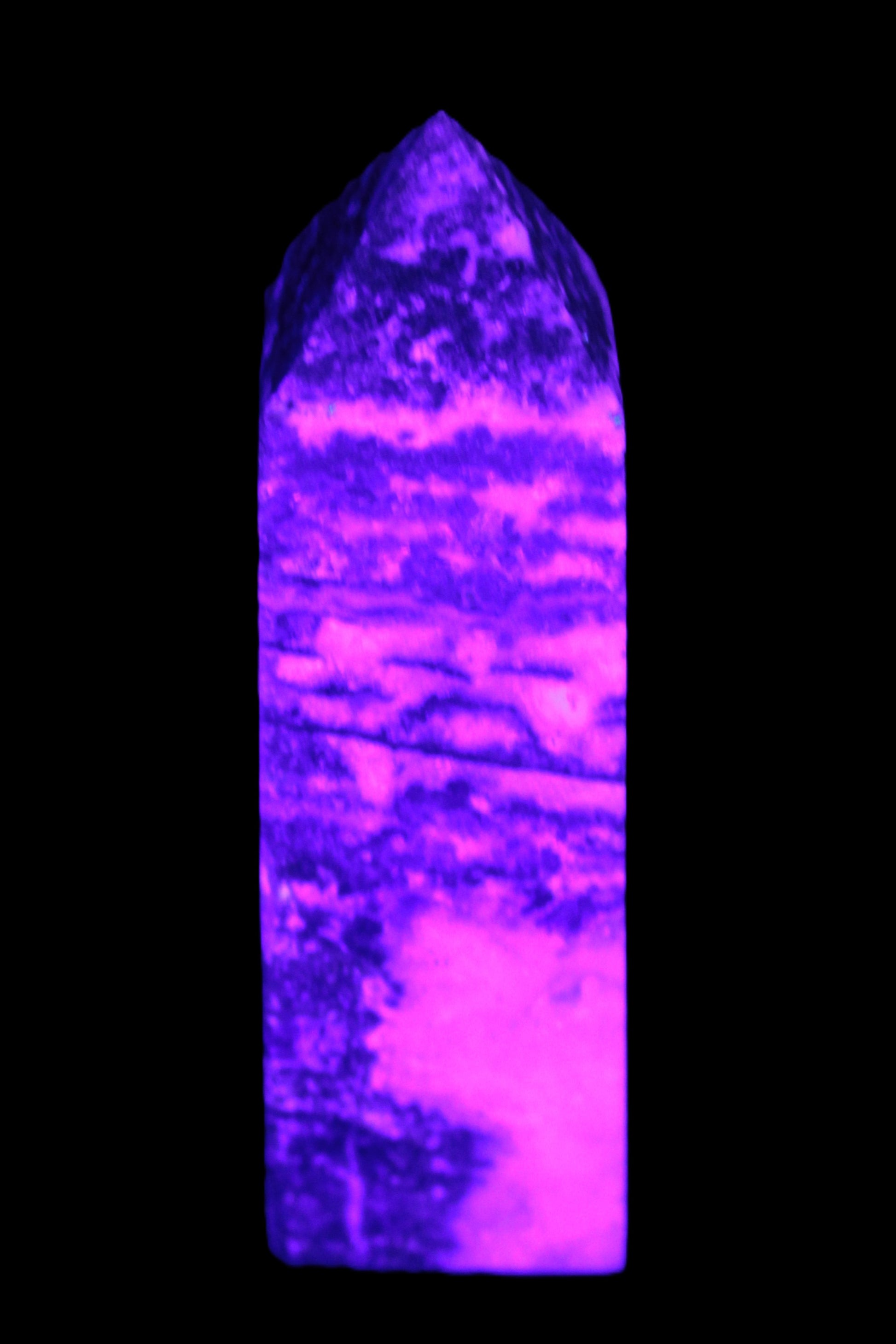 Fluorite obelisk 214g in UV light - Rocks and Things Store