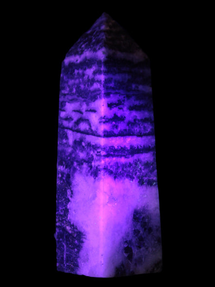 Fluorite obelisk 214g in UV light - Rocks and Things Store