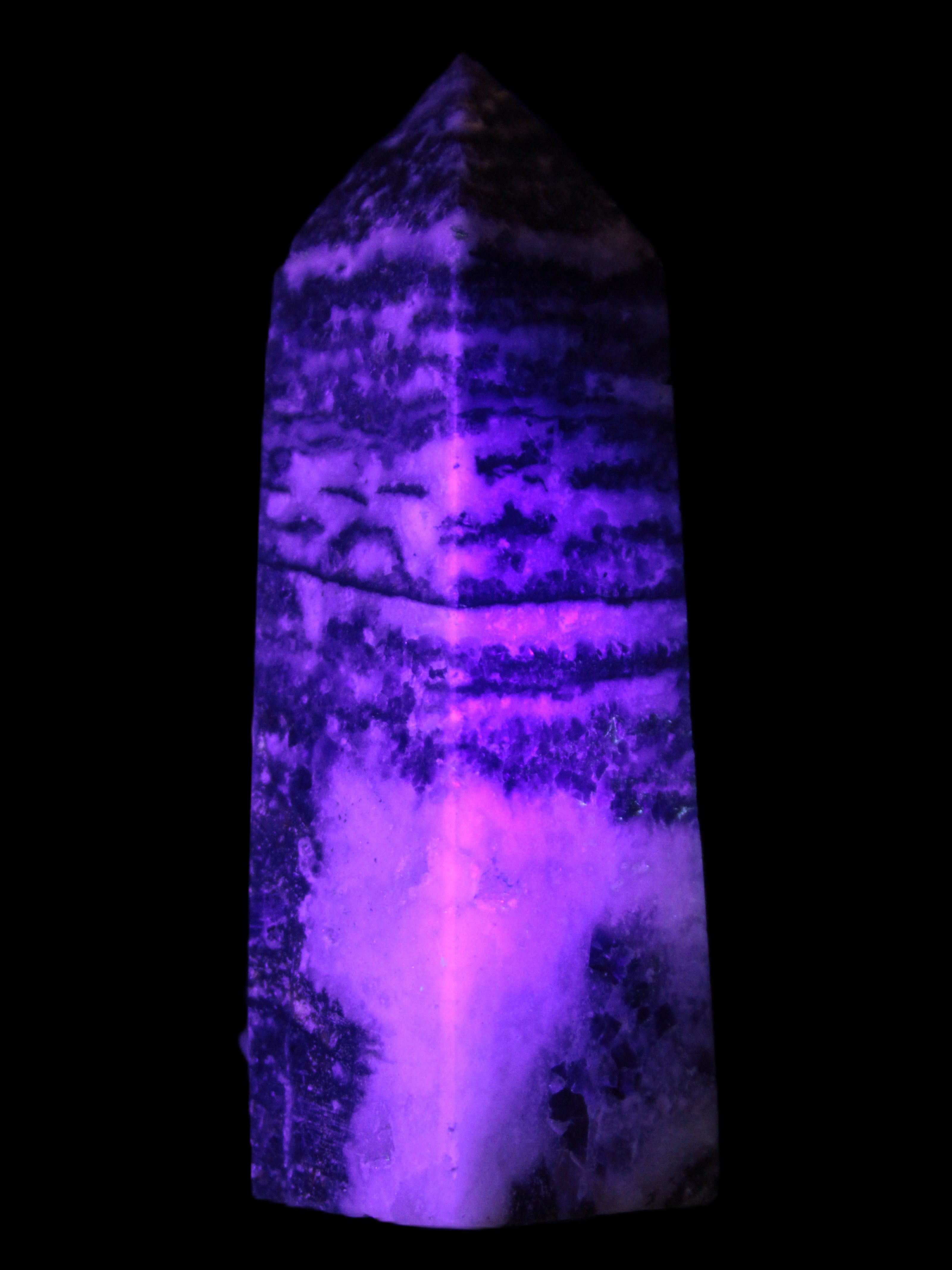 Fluorite obelisk 214g in UV light - Rocks and Things Store