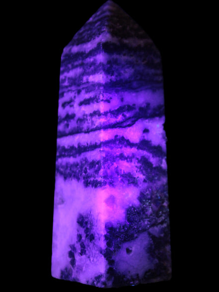 Fluorite obelisk 214g in UV light - Rocks and Things Store