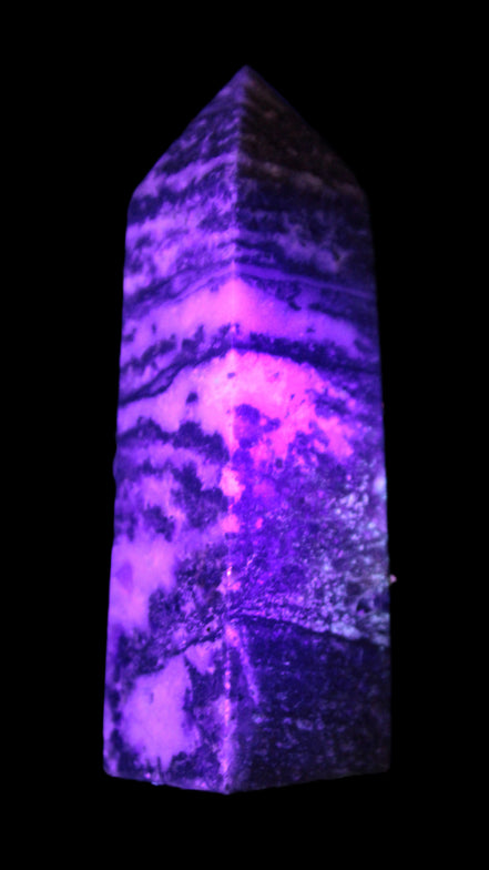 Fluorite obelisk 214g in UV light - Rocks and Things Store