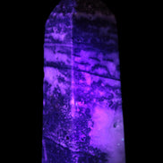 Fluorite obelisk 214g in UV light - Rocks and Things Store