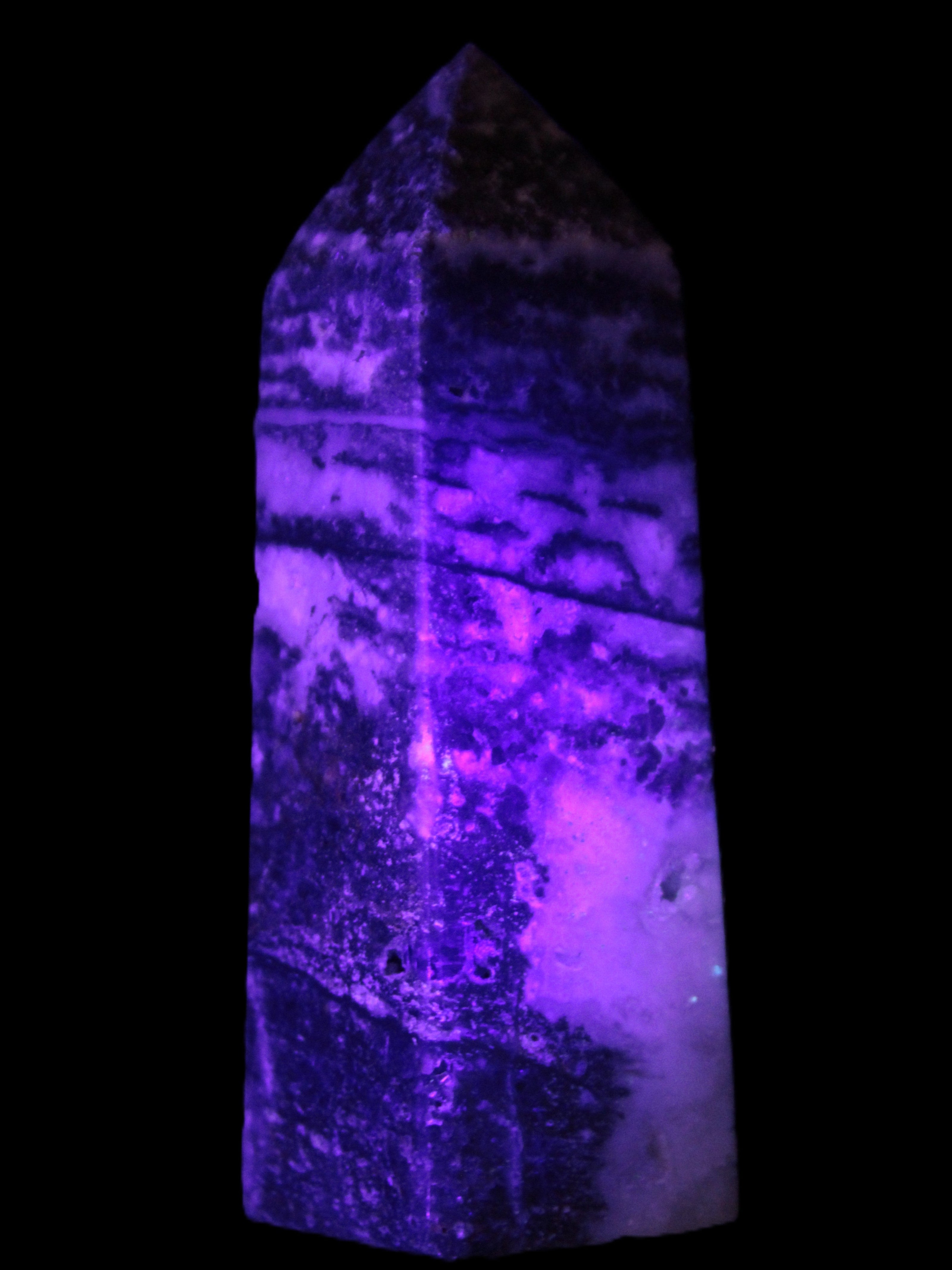 Fluorite obelisk 214g in UV light - Rocks and Things Store