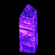 Fluorite obelisk 214g in UV light - Rocks and Things Store