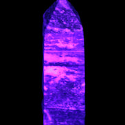 Fluorite obelisk 214g in UV light - Rocks and Things Store