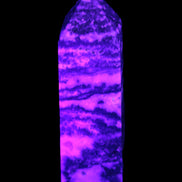 Fluorite obelisk 214g in UV light - Rocks and Things Store