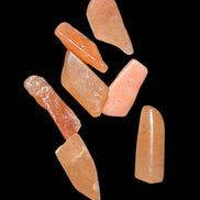 Orange Aventurine 5-7 tiny tumbled stones 5g in sunlight - Rocks and Things Store