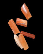 Orange Aventurine 5-7 tiny tumbled stones 5g in sunlight - Rocks and Things Store