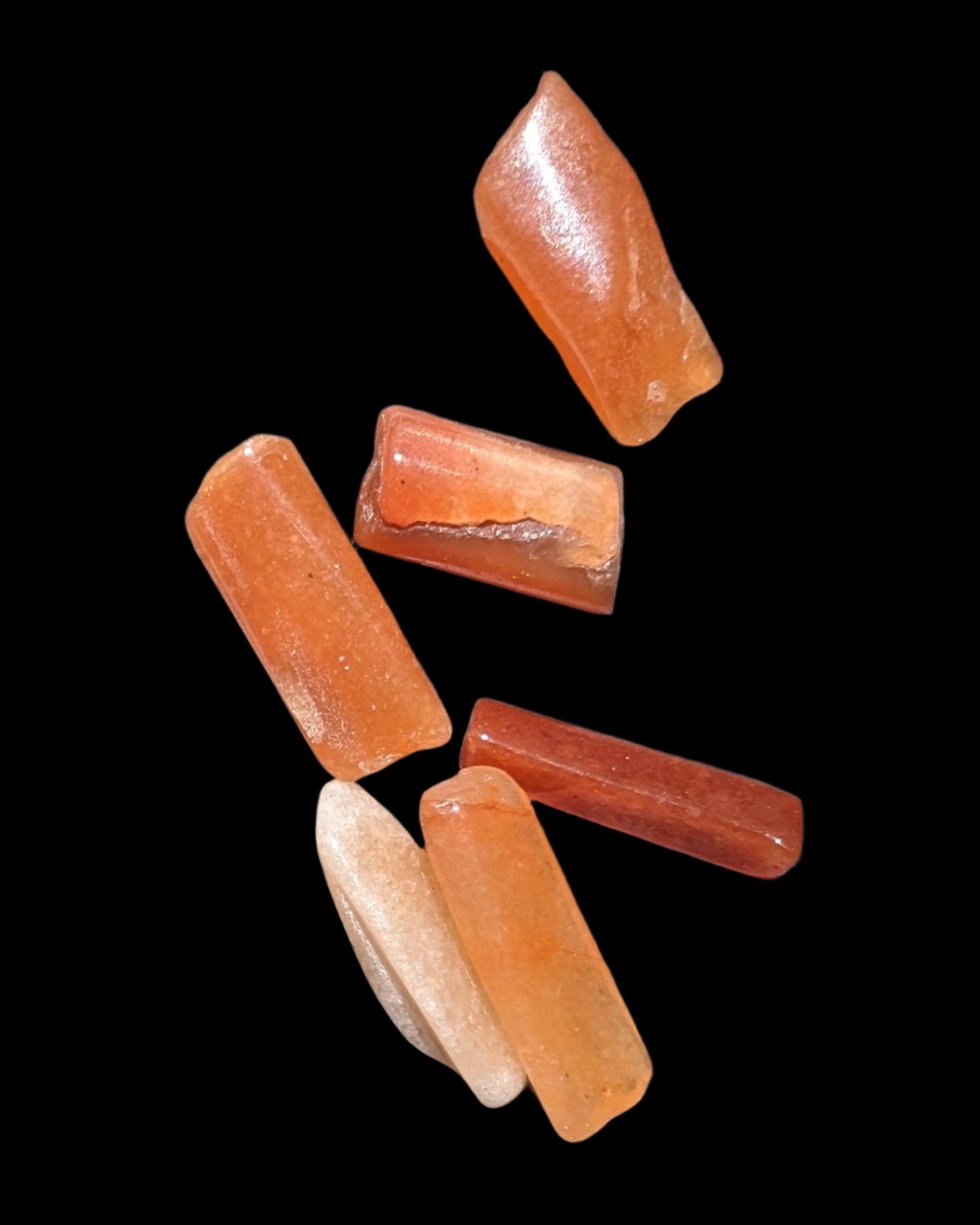 Orange Aventurine 5-7 tiny tumbled stones 5g in sunlight - Rocks and Things Store