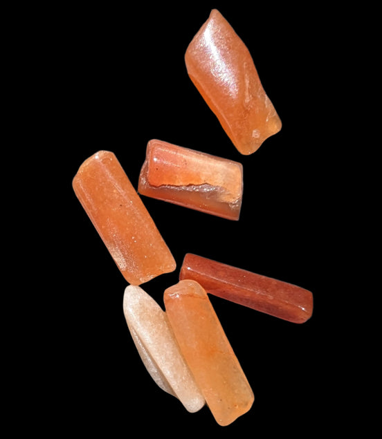 Orange Aventurine 5-7 tiny tumbled stones 5g in sunlight - Rocks and Things Store