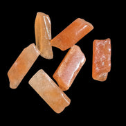 Orange Aventurine 5-7 tiny tumbled stones 5g in sunlight - Rocks and Things Store