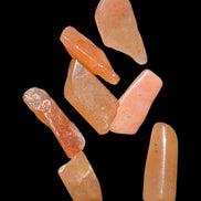 Orange Aventurine 5-7 tiny tumbled stones 5g in sunlight - Rocks and Things Store